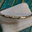 The sterling silver twisted bangle Hot on Sale